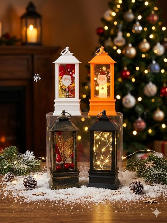 Wholesale collection of four assorted mini retro Christmas lanterns featuring an illuminated Santa design, fairy lights, and red berries, set on a snowy wooden table with a warm fireplace and Christmas tree backdrop.